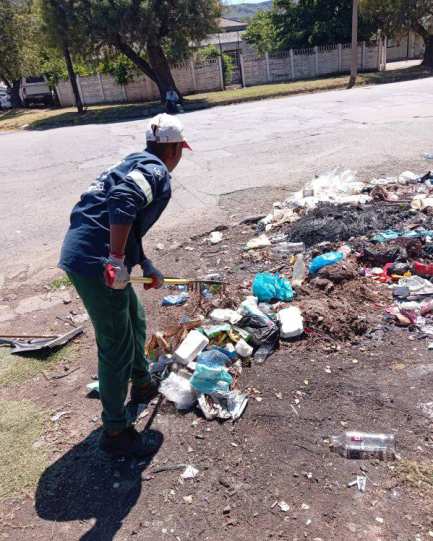 Clean Queenstown Team Battles Trash Piles in Komani Heat