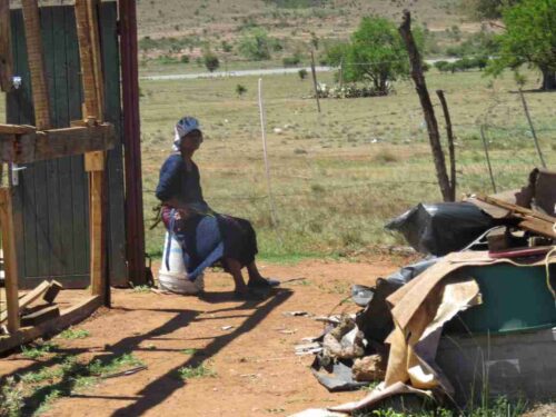 Lulama Ntuthu siting next to her demolished shack
